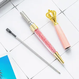 Elegant pink metal crown crystal ballpoint pen set featuring a replacement ink refill