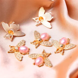 Golden alloy bee and butterfly pendants with pink pearls for DIY jewelry making crafts