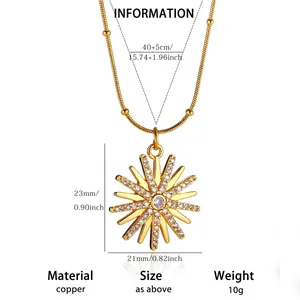 Detail view of 18K gold-plated copper starburst necklace with size dimensions