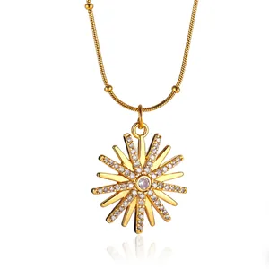 Close-up of elegant 18K gold plated sunburst necklace with micro-pave crystals