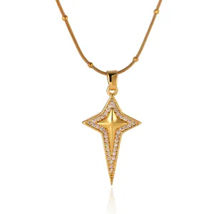 Close-up of 18K gold plated sunburst pendant necklace with micro-pavé crystals