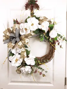 Spring summer faux magnolia wreath with striped ribbons for front door decoration