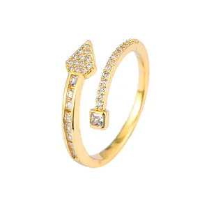 Elegant gold arrow-shaped open ring featuring shimmering cubic zirconia for women.