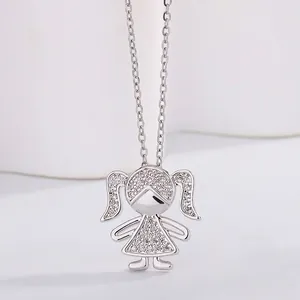 Close-up of a silver cartoon girl pendant necklace with sparkling pavé cubic zirconia