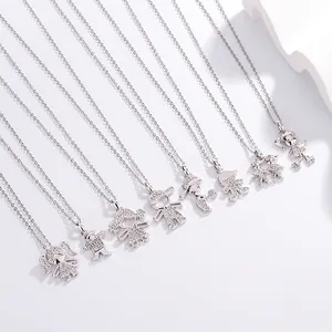 Cute cartoon boy and girl necklaces in silver finish with sparkling pave stones