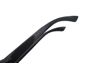 Close-up detail of black pinhole glasses temple arms featuring a sleek and glossy finish