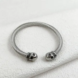 Gothic vintage silver twisted cable C-shaped cuff bracelet with double skull heads
