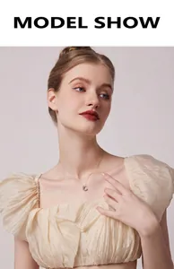 Elegant star and moon zircon pendant necklace shown on a model for jewelry detail
