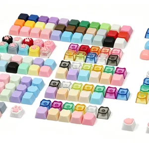Colorful variety of custom mechanical keyboard keycaps with cat paw designs