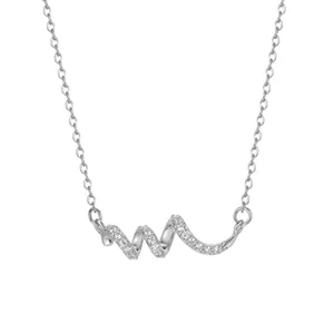 Detailed view of s925 sterling silver wavy pendant necklace with sparkling zirconia