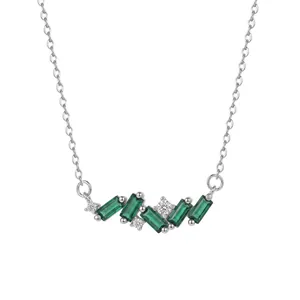Detailed view of S925 sterling silver necklace with emerald green zircon pendants