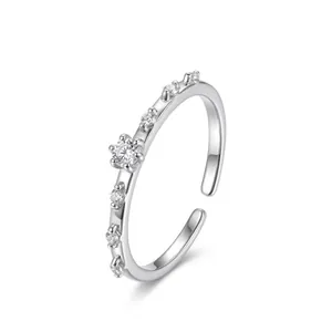 Detailed view of minimalist S925 sterling silver open ring with shimmering zircon stones