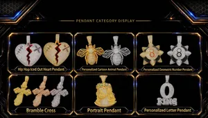 Collection of iced-out hip hop pendants including heart, bee, cross and letter styles.