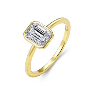 Elegant gold-plated S925 sterling silver ring featuring a clear emerald-cut zircon