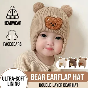 Cute knitted bear earflap hat for babies with soft lining and cartoon embroidery