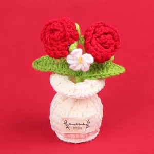 Handmade crochet red rose flower pot with a cute decorative 'With Love' label.