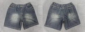 Women's plus size denim shorts with elastic waist and wide-leg fit in dark blue wash