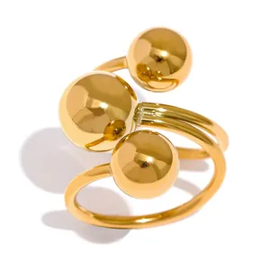 Elegant gold stainless steel open ring featuring a unique triple ball decorative design
