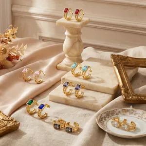 Details of multi-color rectangular cubic zirconia earrings in vintage gold plating