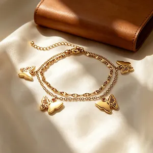 Double-layered stainless steel gold bracelet featuring exquisite hollow butterfly charms