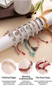 Detail view of handmade braided silver bracelet showing fine craftsmanship and buckle.