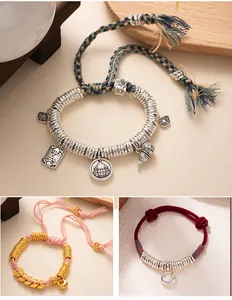 Handmade New Chinese style braided bracelet with silver charms and adjustable rope
