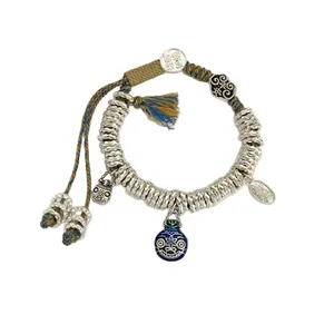 Handmade woven bracelet with silver nuggets and beast charm in New Chinese style