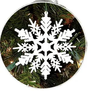 White snowflake Christmas tree ornament for festive holiday party and home decoration