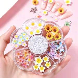 7-compartment mixed nail art decoration kit featuring assorted flowers and white pearls