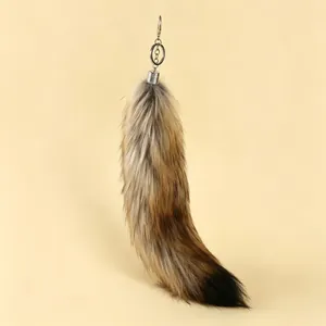 Large real fox tail fur keychain accessory for handbags or car keys in natural brown