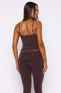 Back view detail of chocolate brown sleeveless camisole top with matching flared pants