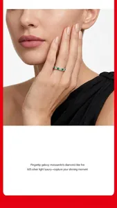 Close-up detail of an elegant S925 silver ring with moissanite and green gemstones on finger