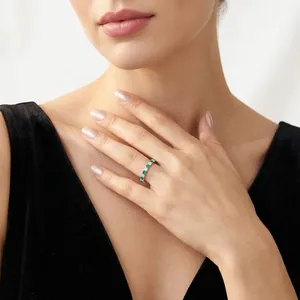 Elegant S925 silver ring featuring sparkling green gemstones and moissanite accents.