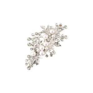 Detailed view of an elegant silver alloy hair clip with pearls and sparkling rhinestones