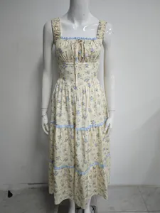 Detailed look at a floral print tiered maxi dress with square neck and ruffle trim