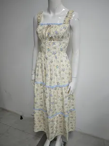 Detailed shot of cottagecore floral maxi dress with square neck and blue lace ruffles