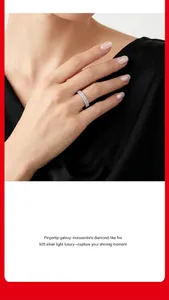 Elegant detail shot of a woman wearing a shimmering S925 silver moissanite eternity ring