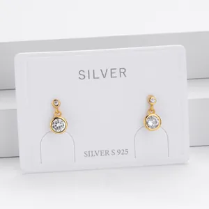 Elegant S925 sterling silver gold-plated stud earrings featuring round cubic zirconia