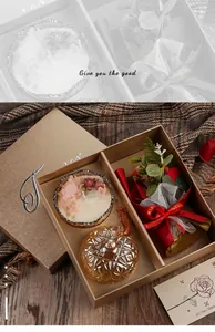 Elegant scented candle and flower bouquet gift set for Mother's Day celebrations in gold box