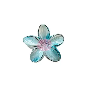Sweet frangipani hair claw clip with blue doodle print for women beach vacation