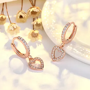 Elegant rose gold plated heart hoop earrings featuring sparkling cubic zirconia stones