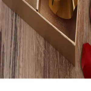 Detail view of luxury golden metal tray edge for scented candle gift set