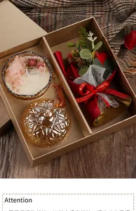 Elegant scented candle gift set with dried flowers and artificial rose bouquet.