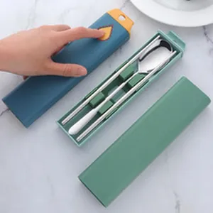 Portable stainless steel cutlery set including spoon and chopsticks in a travel case