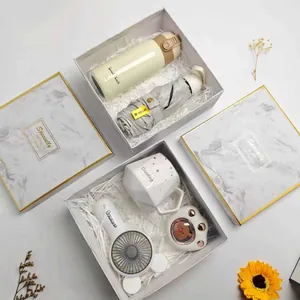 Elegant souvenir gift set with vacuum flask, mini umbrella, and ceramic mug