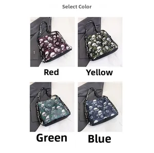 Stylish tote bag with skull and floral print available in four color variants.