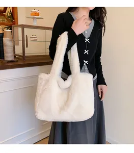 Soft white faux fur tote bag for winter fashion showing plush texture and large capacity