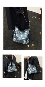 Detailed views of a skull and flower print backpack shown in different carrying styles.