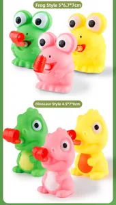 Vue détaillée de jouets à presser grenouille et dinosaure avec sifflets
