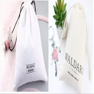 Detailed view of custom fabric drawstring pouches for jewelry and small accessories.